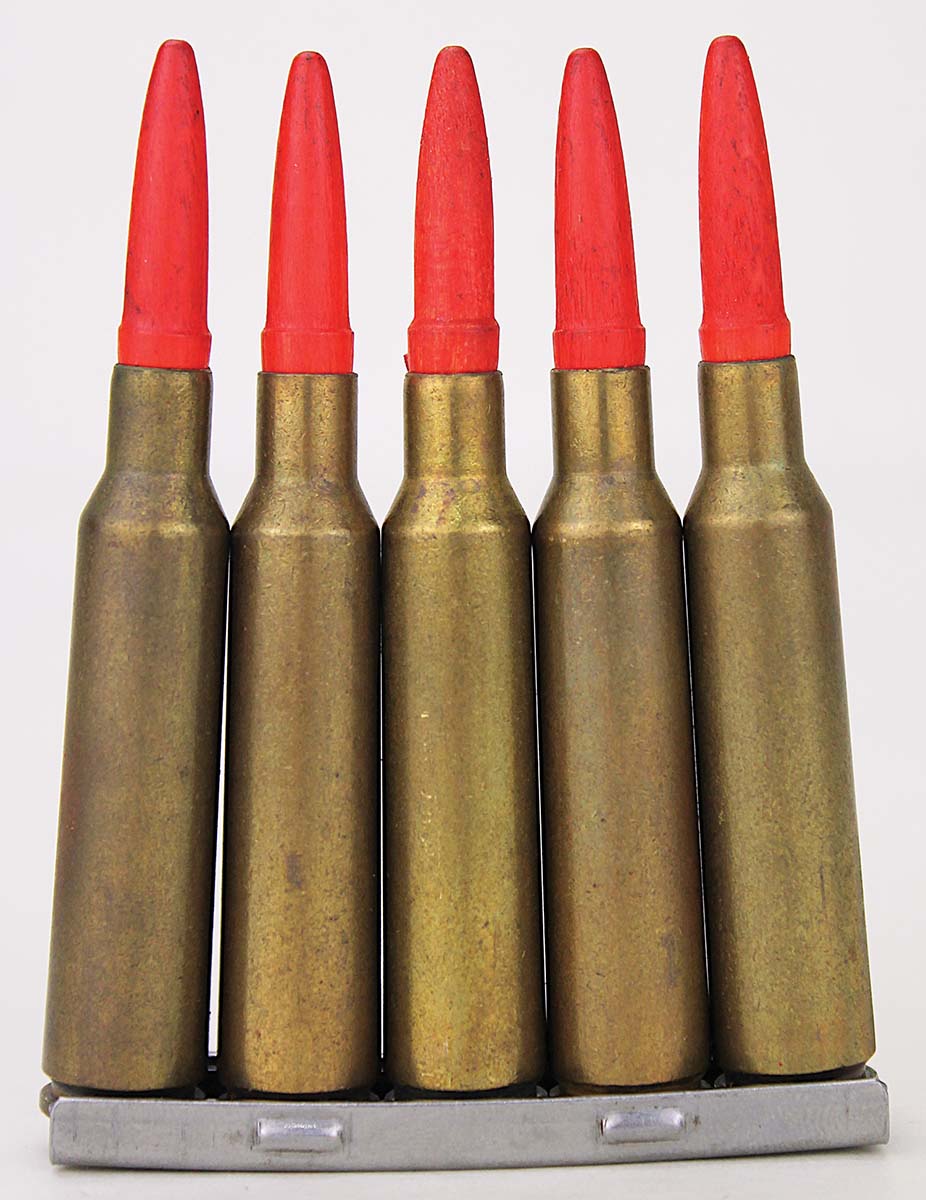 Bright red color immediately identifies these as Model 14 wooden bullet blanks for training purposes. They came in 10- and 20-round boxes loaded on stripper clips.